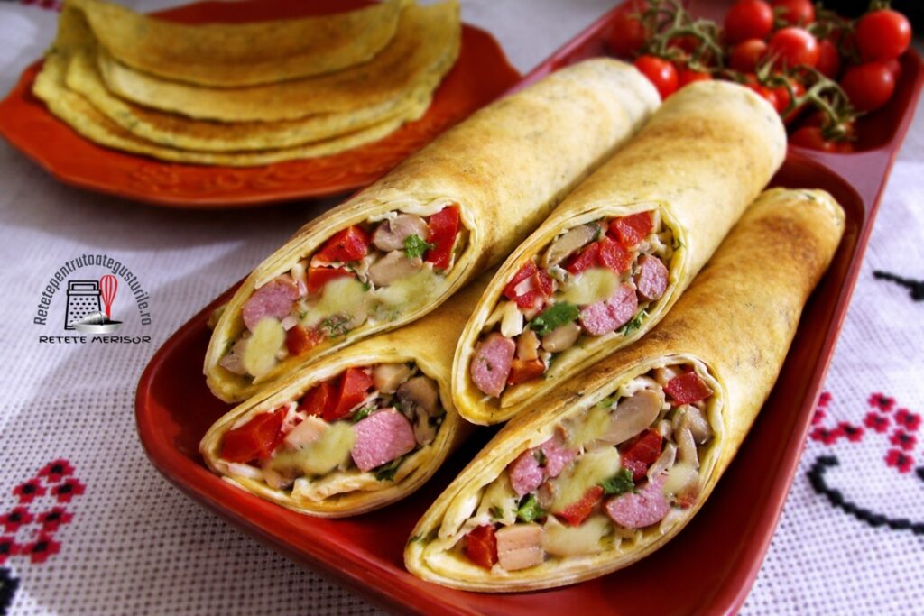 Clatite cu malai in aluat si umplutura de pizza sectionate Clatite cu malai in aluat si umplutura de pizza sectionate