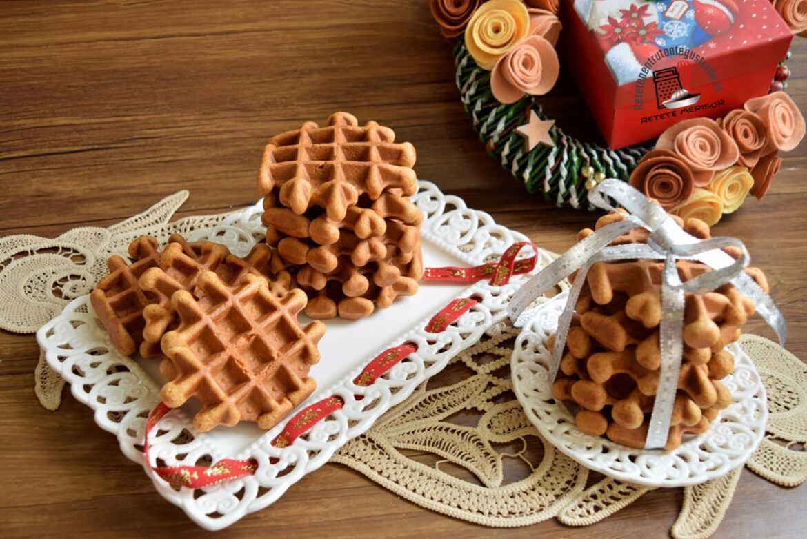 Gingerbread waffles. Vafe din aluat de turtă dulce pe două farfurii și o coroniță de Crăciun