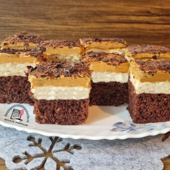 Negresă cu cocos și caramel sărat porționată pe un platou oval